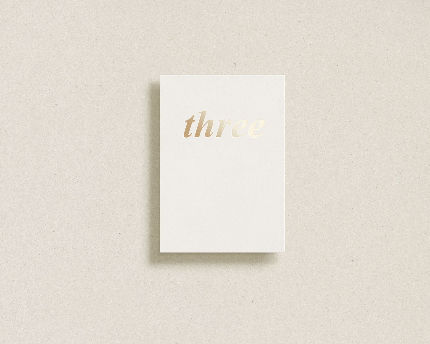 'three' gold foil greeting card
